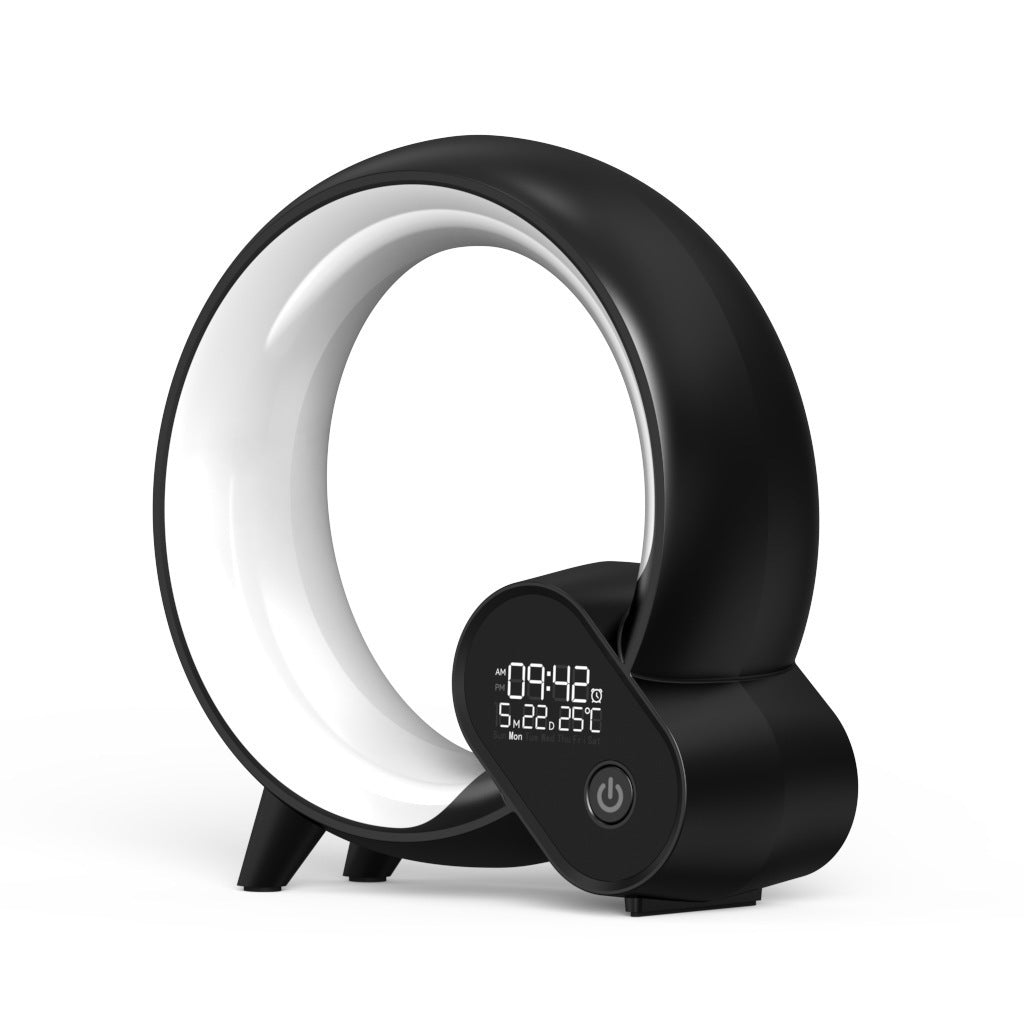 Black and white circular device with digital display on a white background