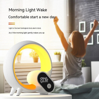 Light alarm clock with a person waking up in the background