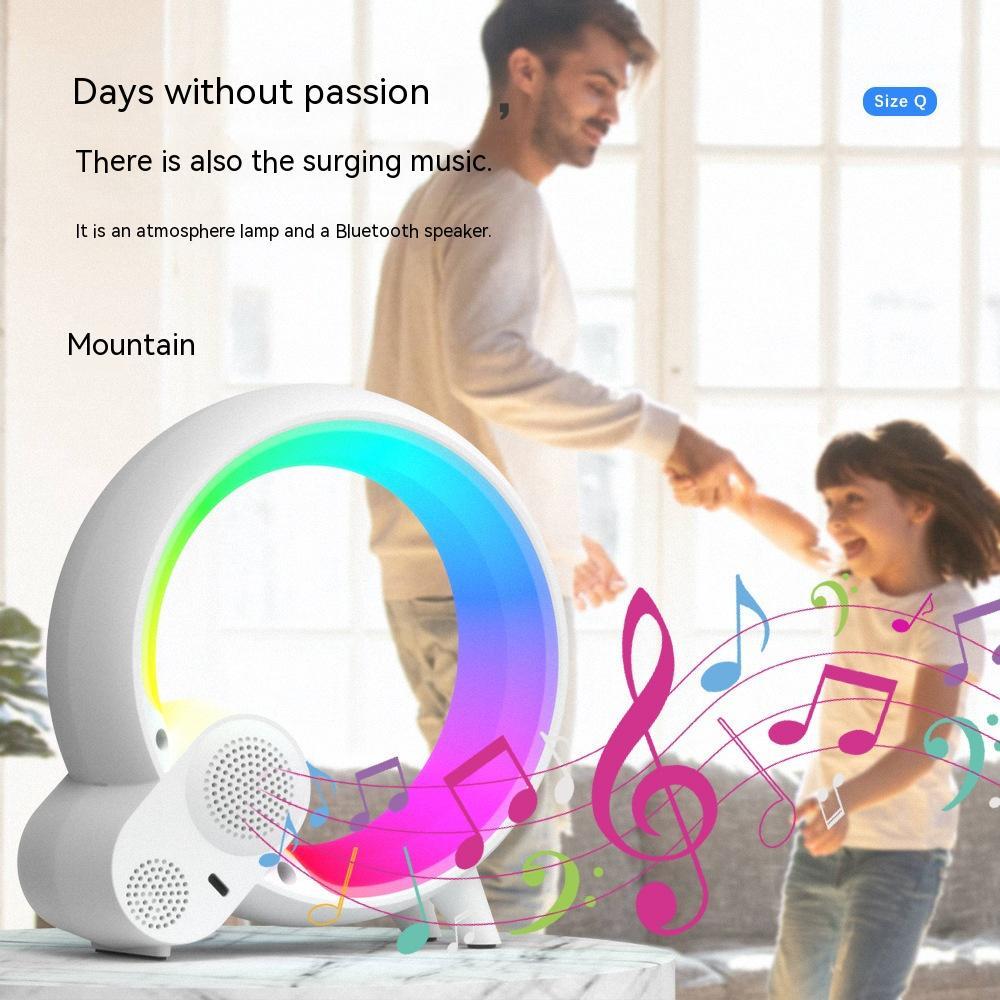 Colorful lamp with Bluetooth speaker and musical notes, family in the background
